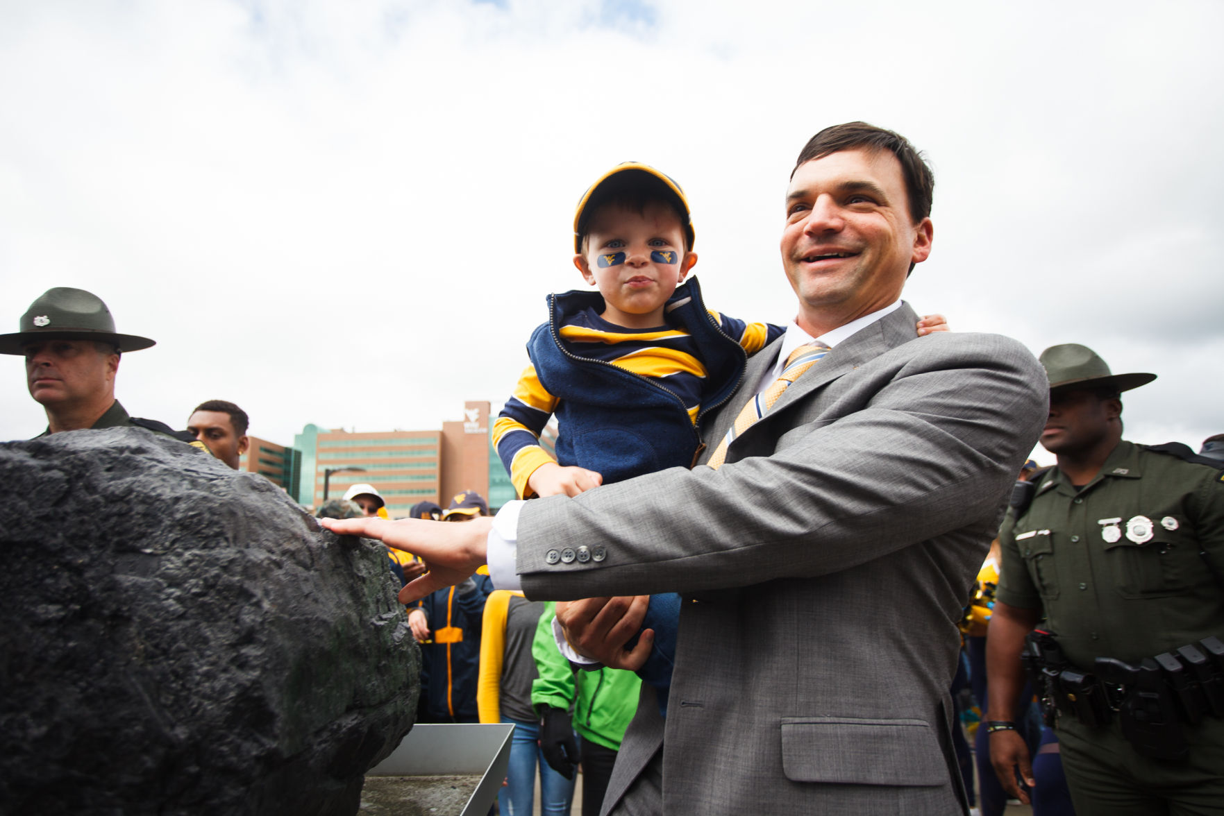 October 12, 2019: Head Coach Neal Brown and son touch the coal prior to the West Virginia Mountaineers taking on the Iowa State Cyclones at Milan Puskar Stadium.
